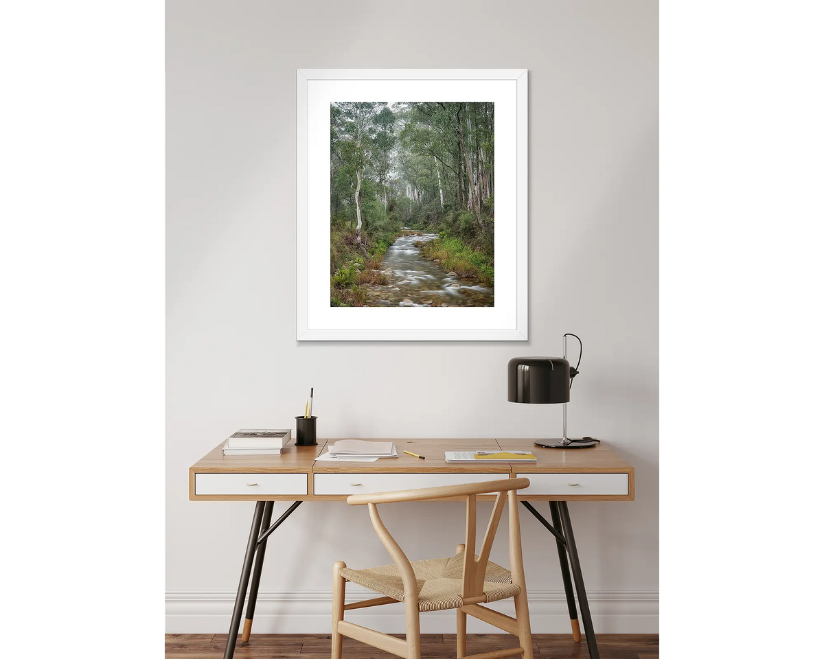 Allure. Wall art print, in white and hung above a desk.