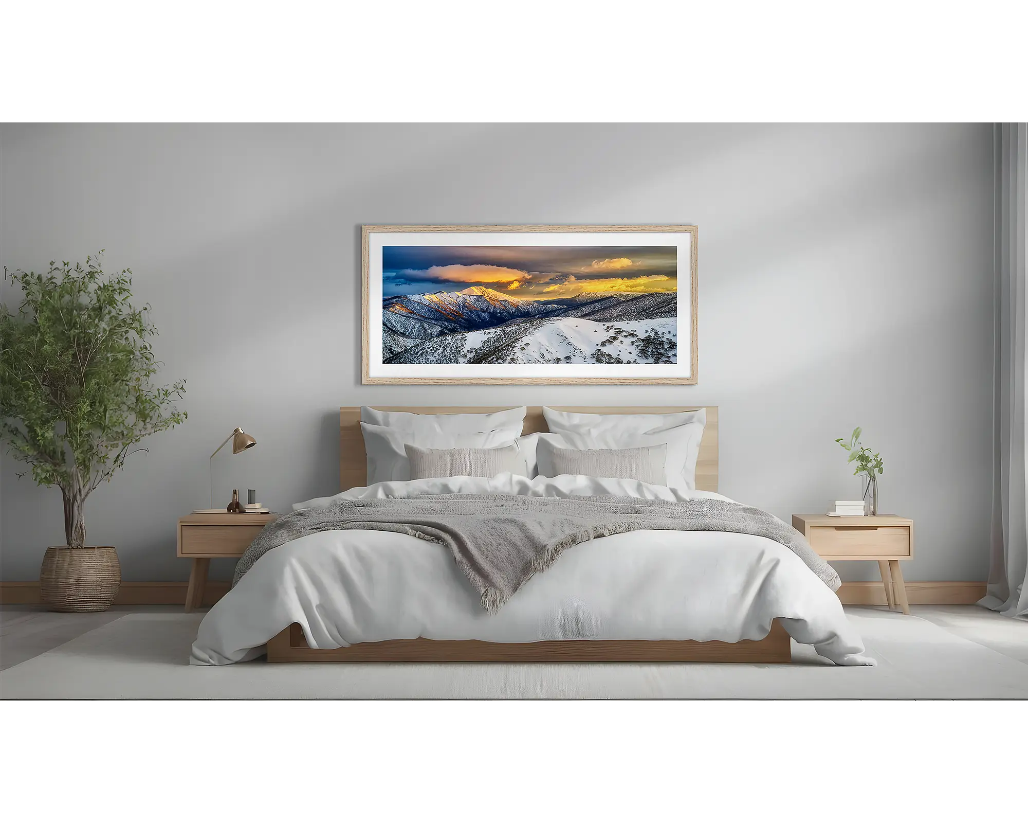 Alpine Magic. Winter snow sunrise wall art  in Tasmanian Oak frame above a bed.