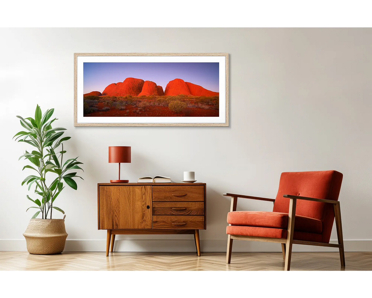 Ancient Land. Framed outback wall art, hanging on a wall, above a side table. 