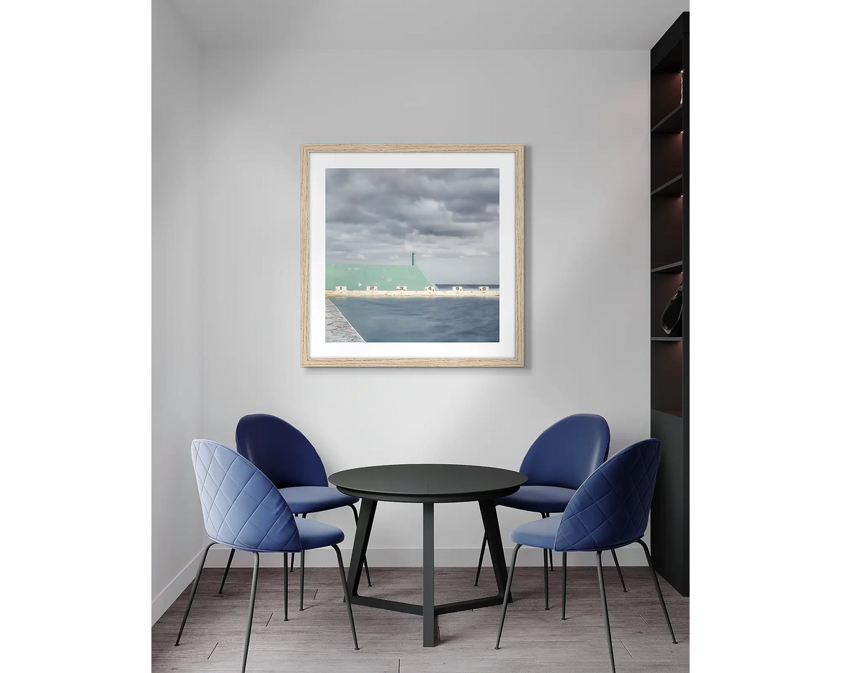 Angles. Newcastle baths, framed wall art with a timber frame, in an office meeting room. 