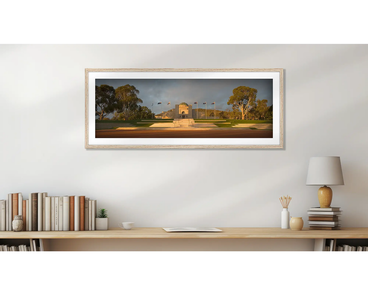 Australian War Memorial. Wall art print, with a timber frame, above a desk. 