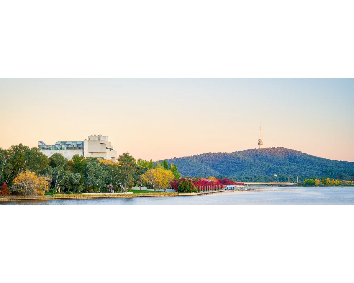 Autumn Arrival. Autumn sunrise lighting up the High Court and Black Mountain Tower, Canberra.