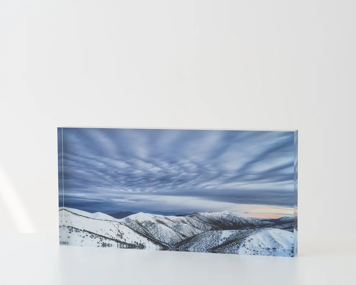 Before the Storm. Acrylic block of clouds over the Razorback and Mount Feathertop summit. Australian artwork on table.