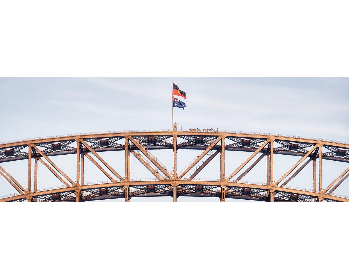 Bridge Climb. People on top of Sydney Harbour Bridge at sunset.