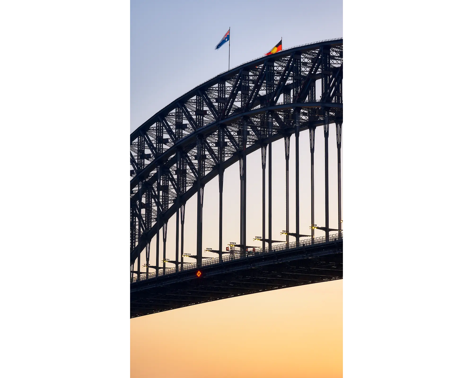 Sydney Harbour Bridge at sunset.