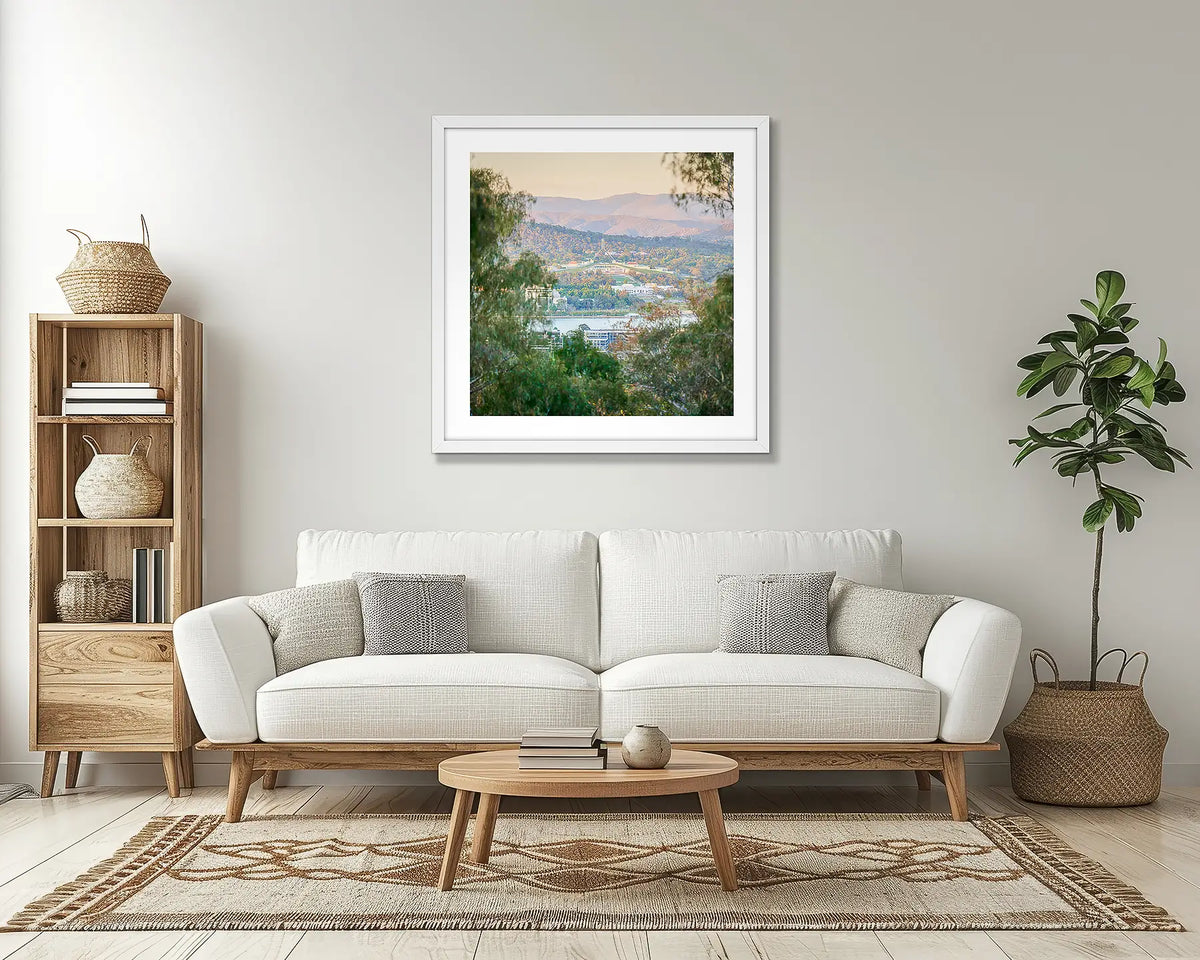 Capital View. Canberra wall art print, with a white frame, in a lounge room. 