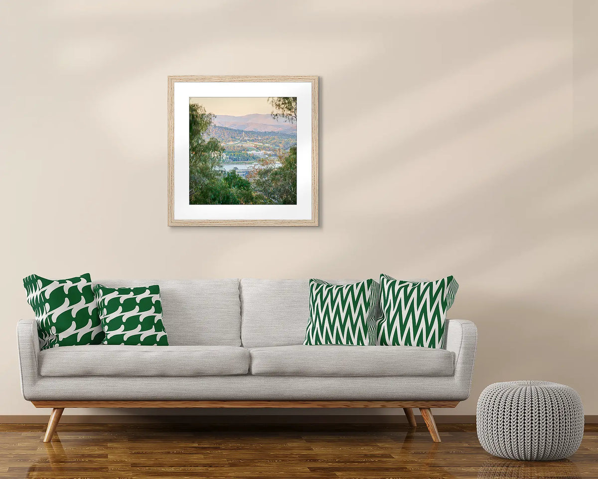 Capital VIew. Framed Canberra wall art print, hanging above a couch.