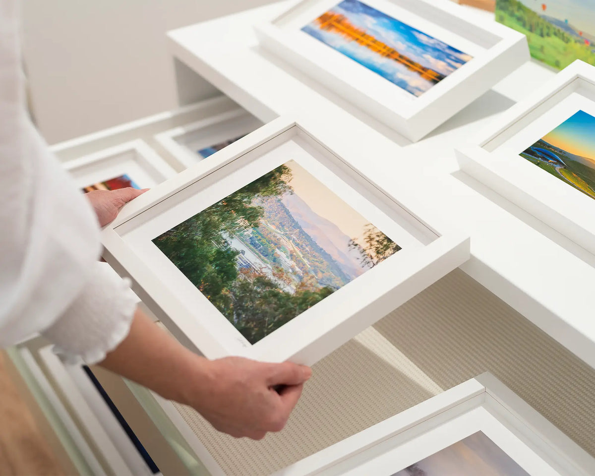 Capital View. Sunrise on Parliament House. Canberra wall art in white frame.