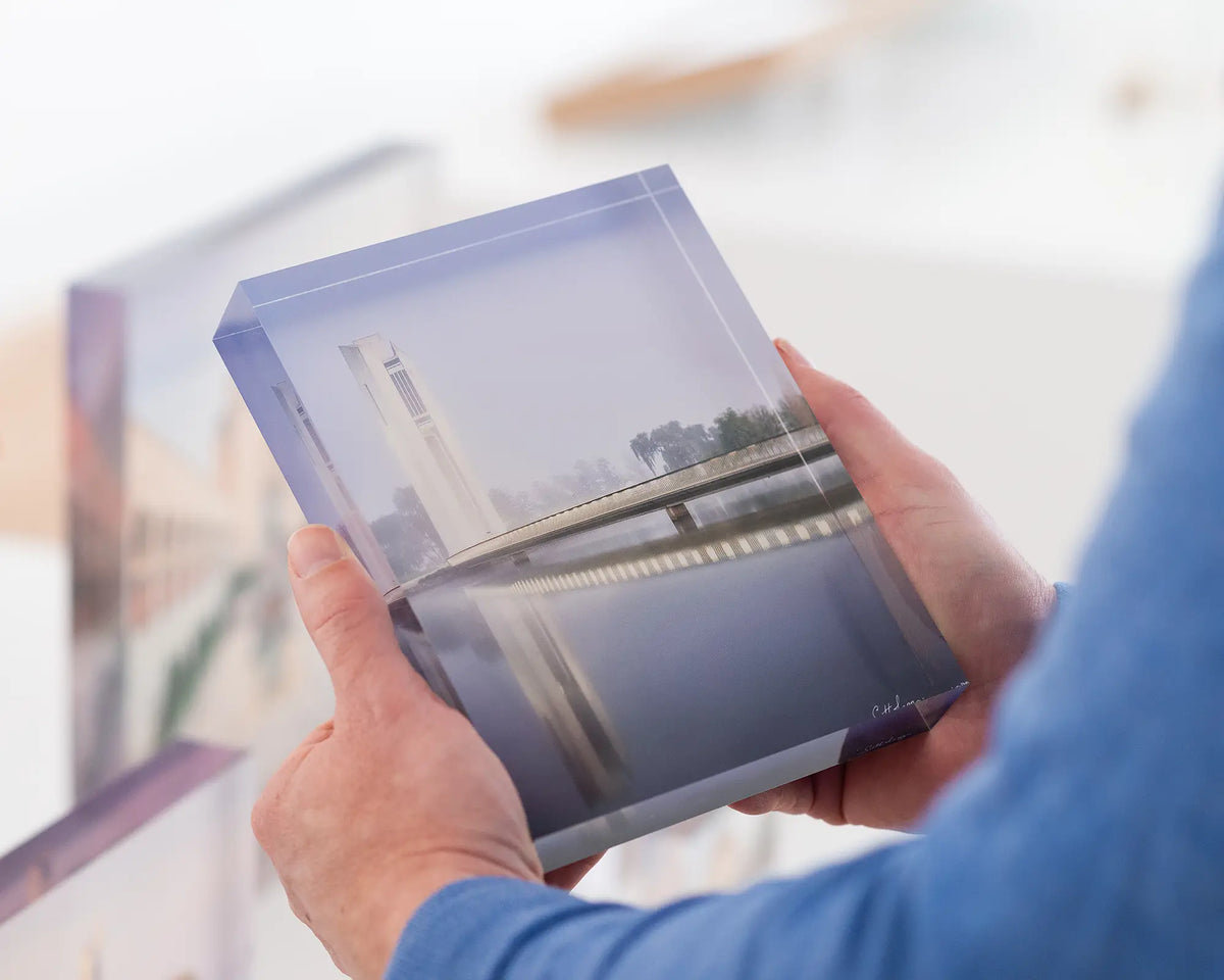 Carillion Blues. Acrylic block of the National Carillion in morning fog. Canberra artwork being held.