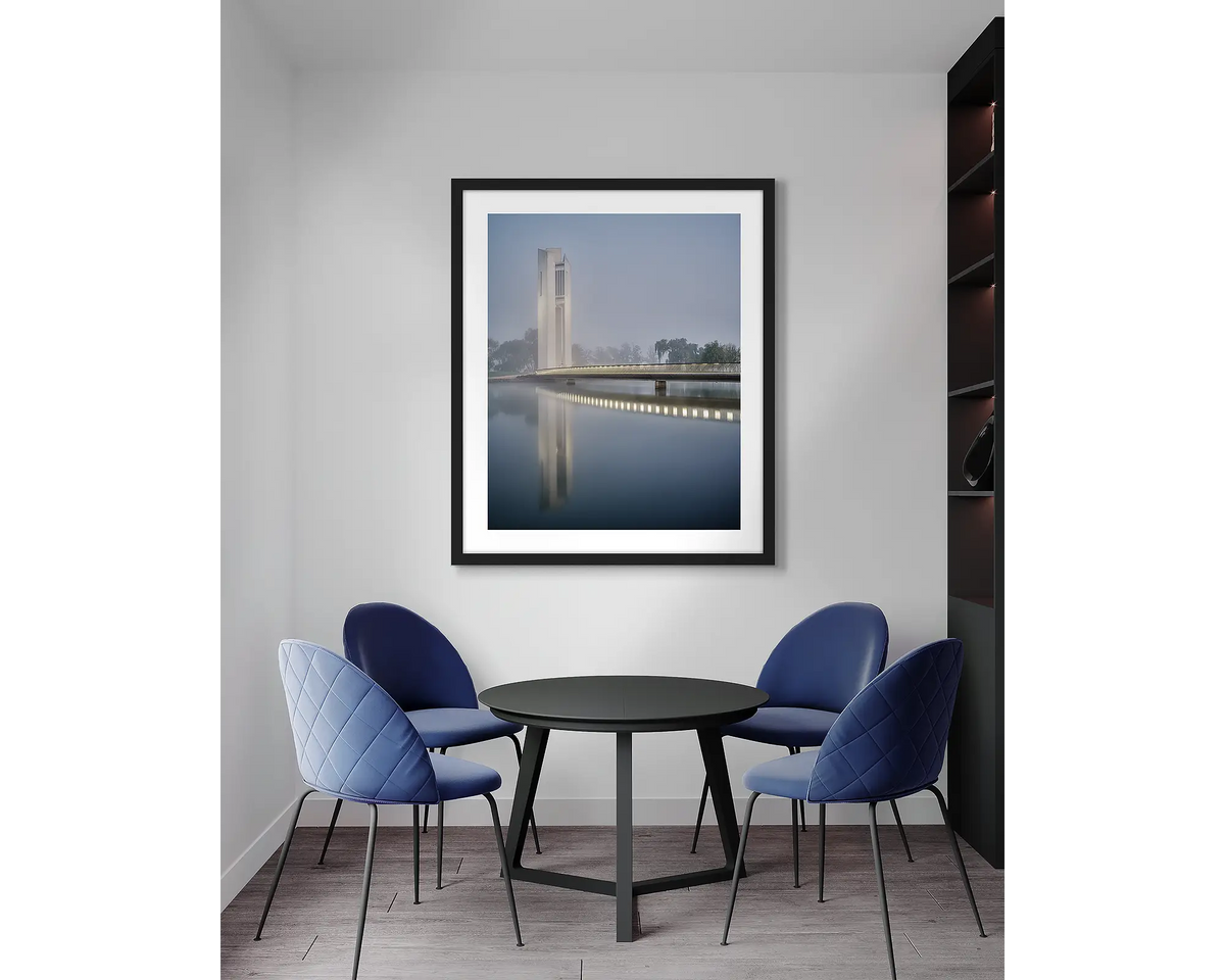 Carillon Blues. Canberra, framed wall art print, with a black frame, in an office meeting room. 