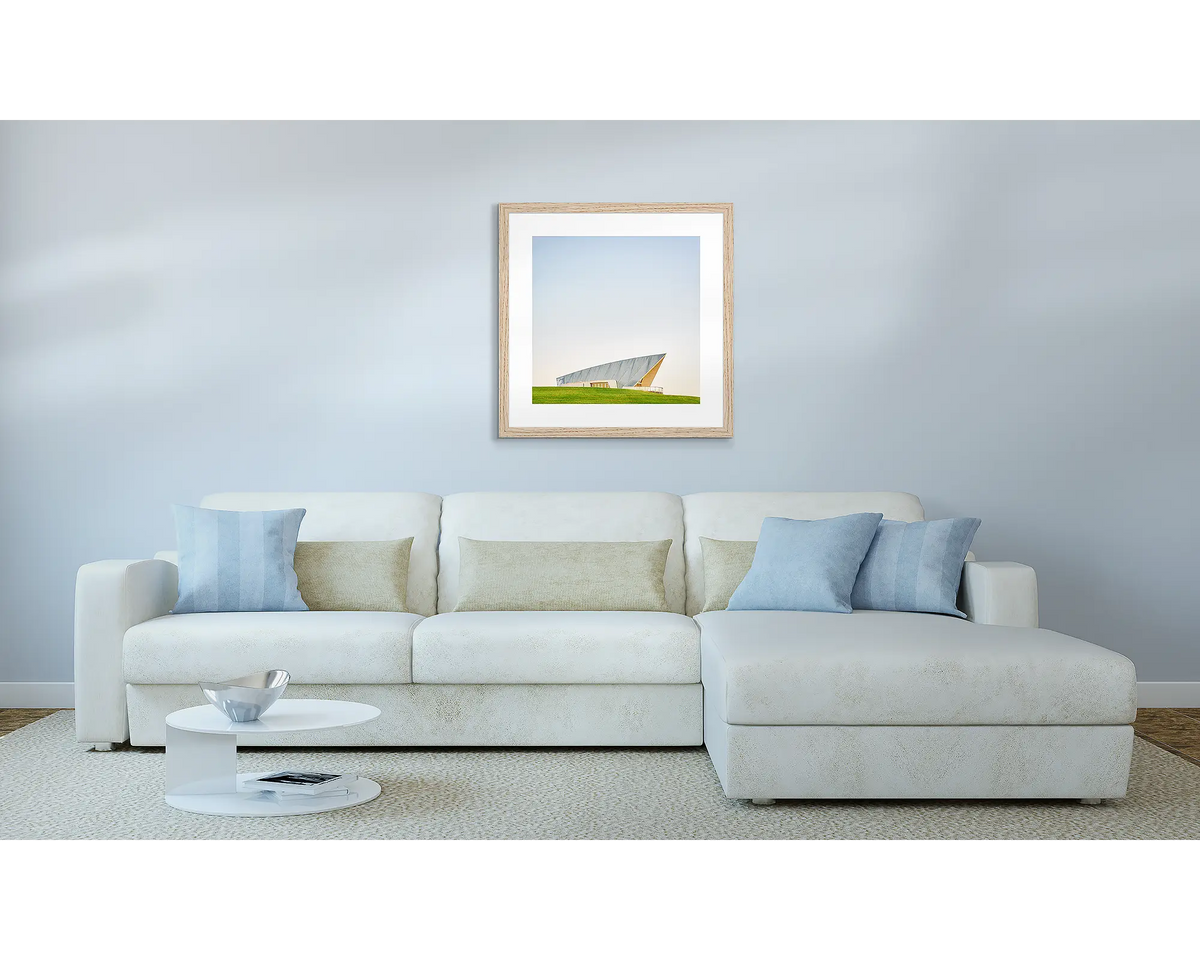 Clarity. Canberra artwork in a Tasmanian oak frame, above a couch.