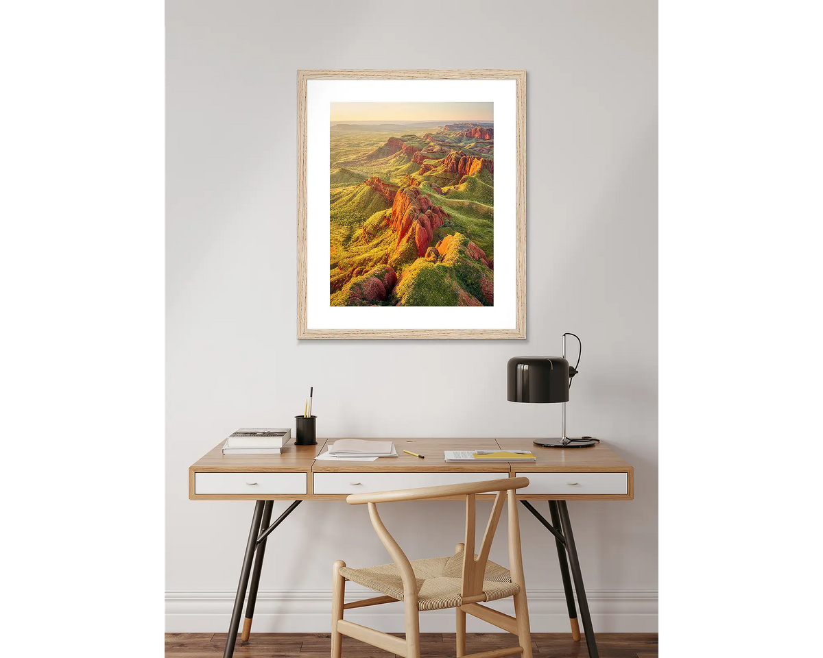 Classic Kimberley. Wall art print with a Tasmanian Oak frame, hanging above  a desk.