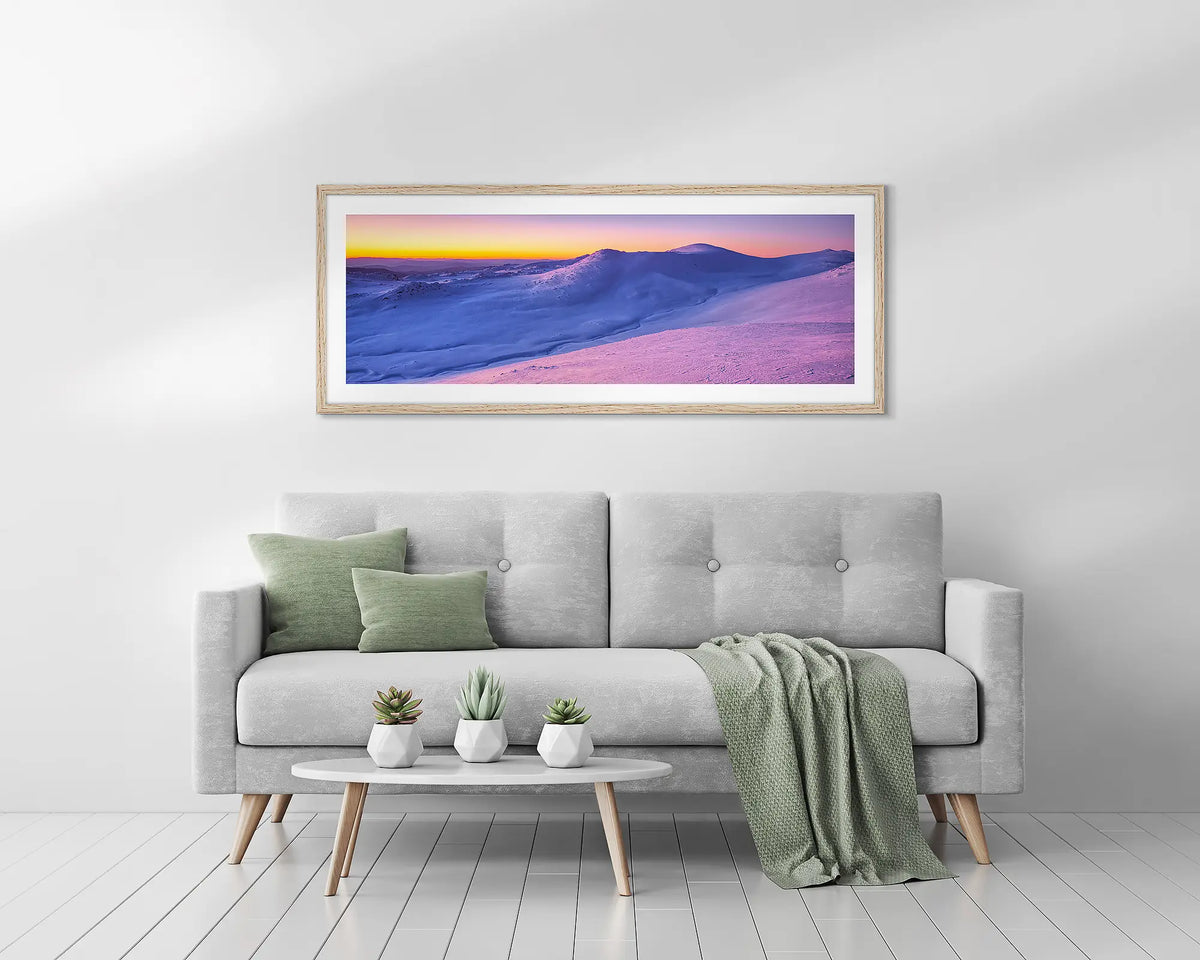 Colours of Winter. Mount Kosciuszko wall art with wood frame hung above couch.