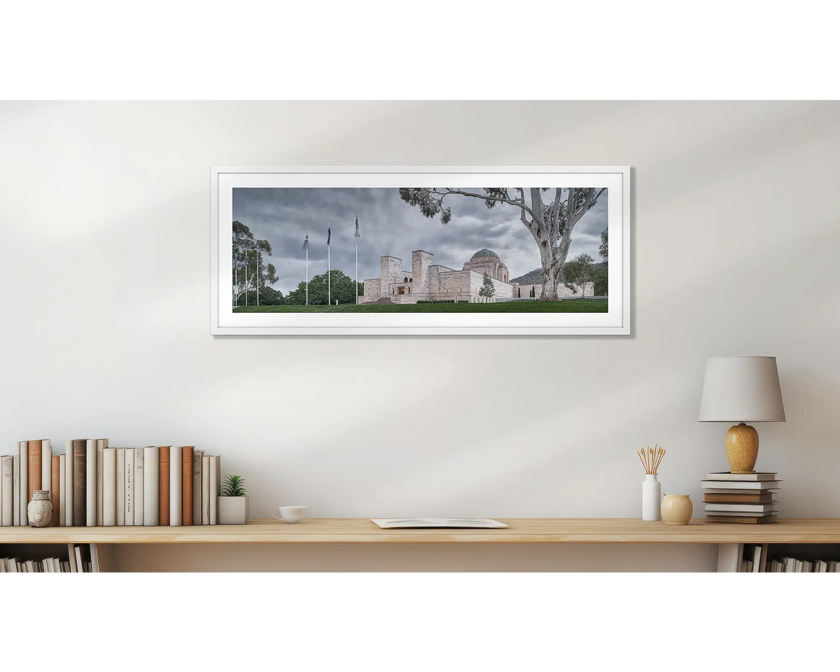 Commemorating Sacrifice. Australian War Memorial artwork with a white frame, on a study wall. 