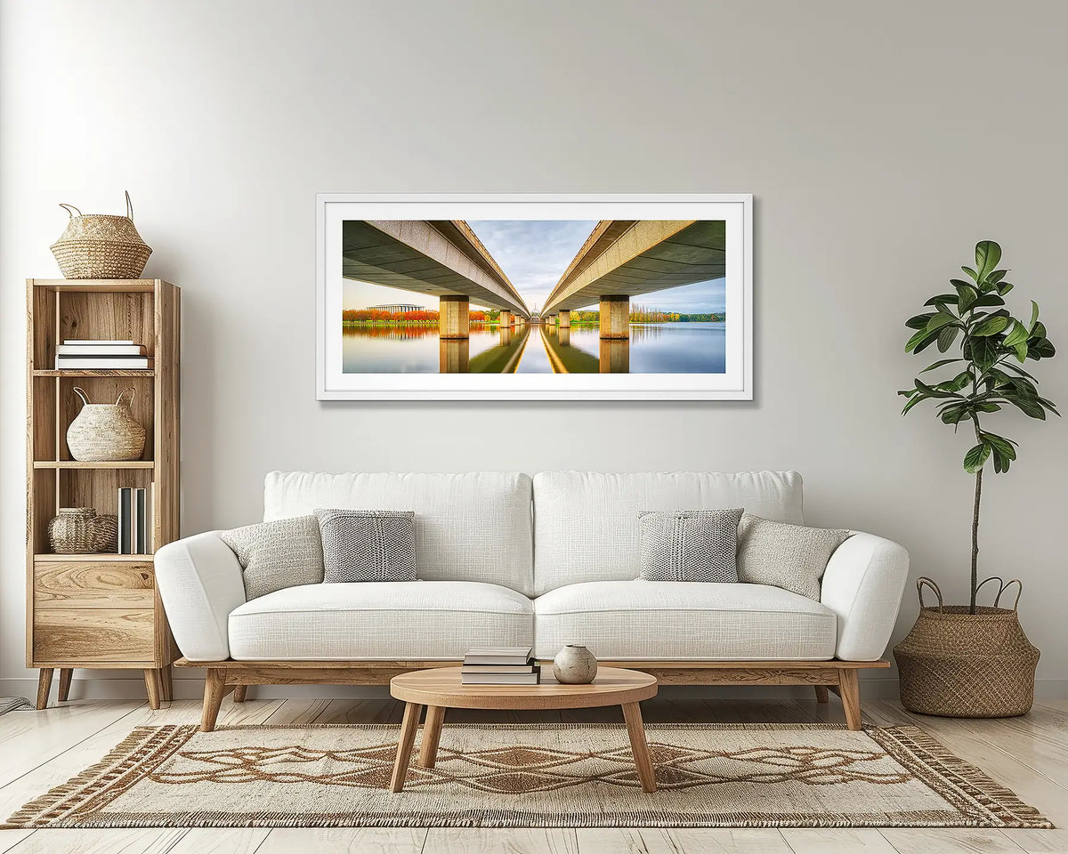 Convergent. White framed, Canberra wall art, hanging above a couch. 