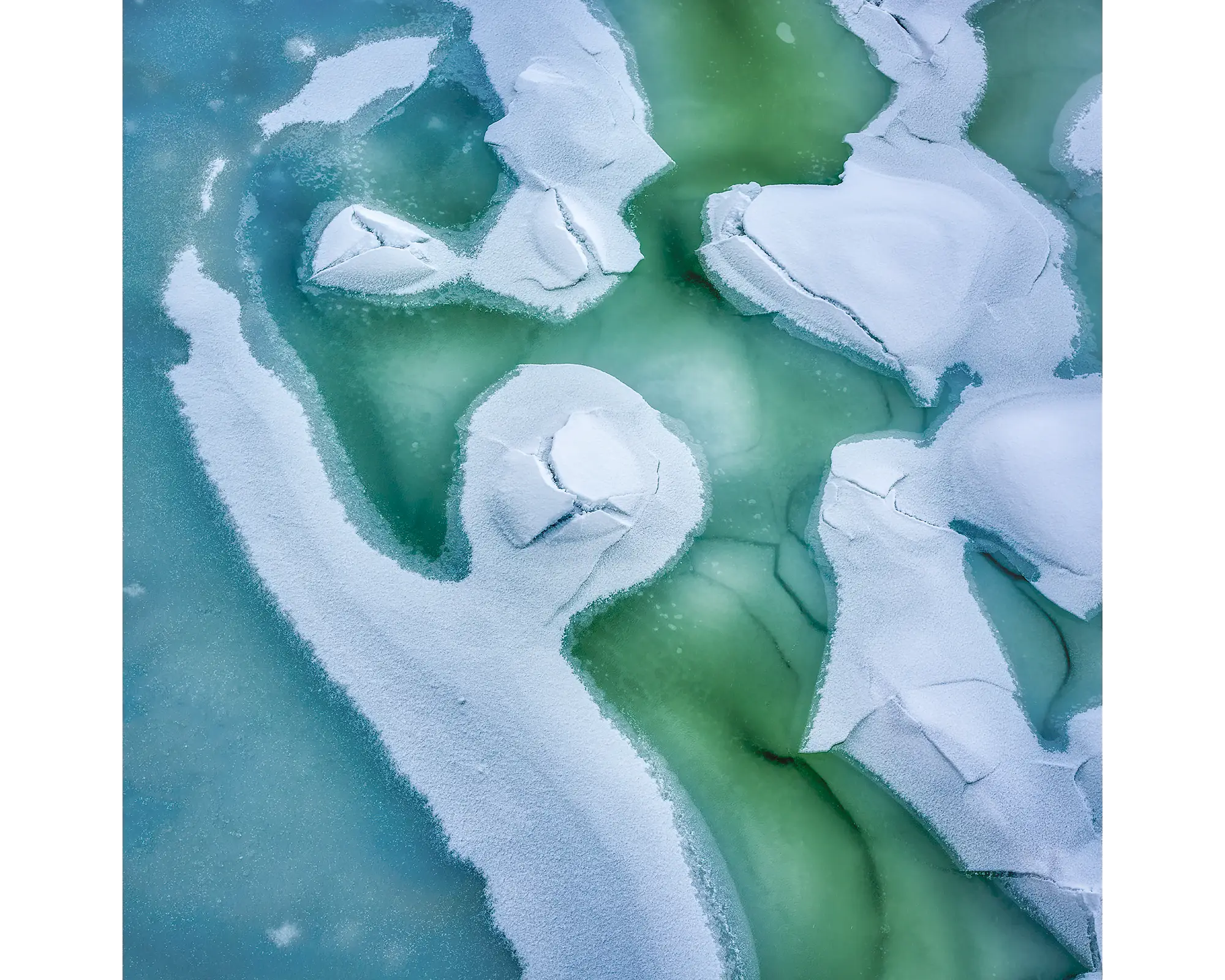 Aerial view of snow and ice on the Snowy River, Kosciuszko National Park.