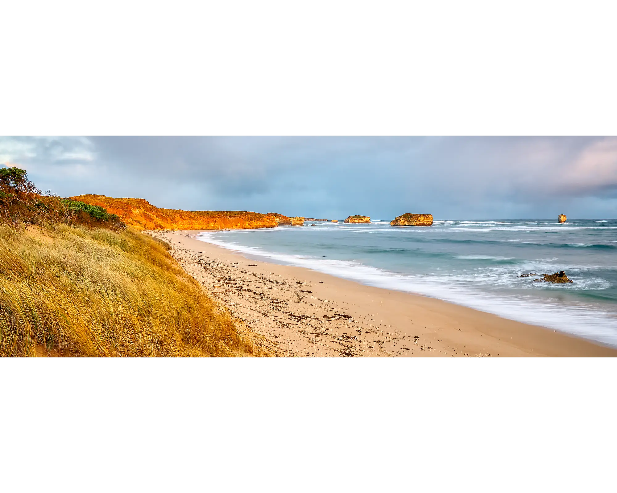 Crofts Bay. Great ocean road at sunset with orange cliffs, Vicotira.