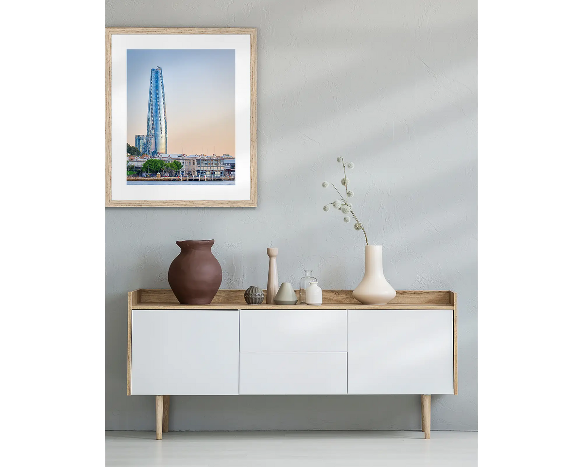 Crown Towers. Framed Sydney wall art with a Tasmanian Oak frame, above a side table.