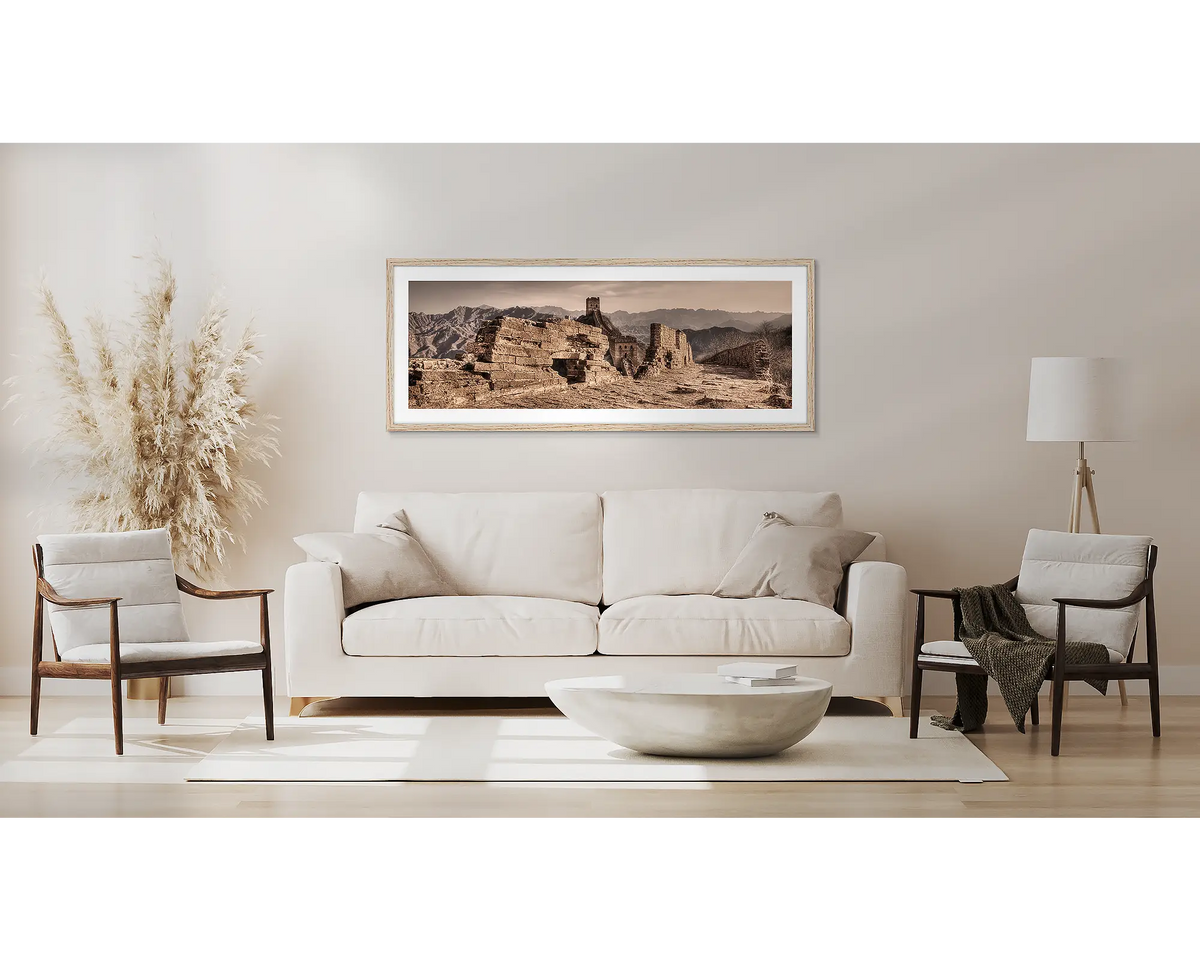 Crumbling Wall. Great Wall of China artwork, with a Tasmanian oak frame, above a couch. 