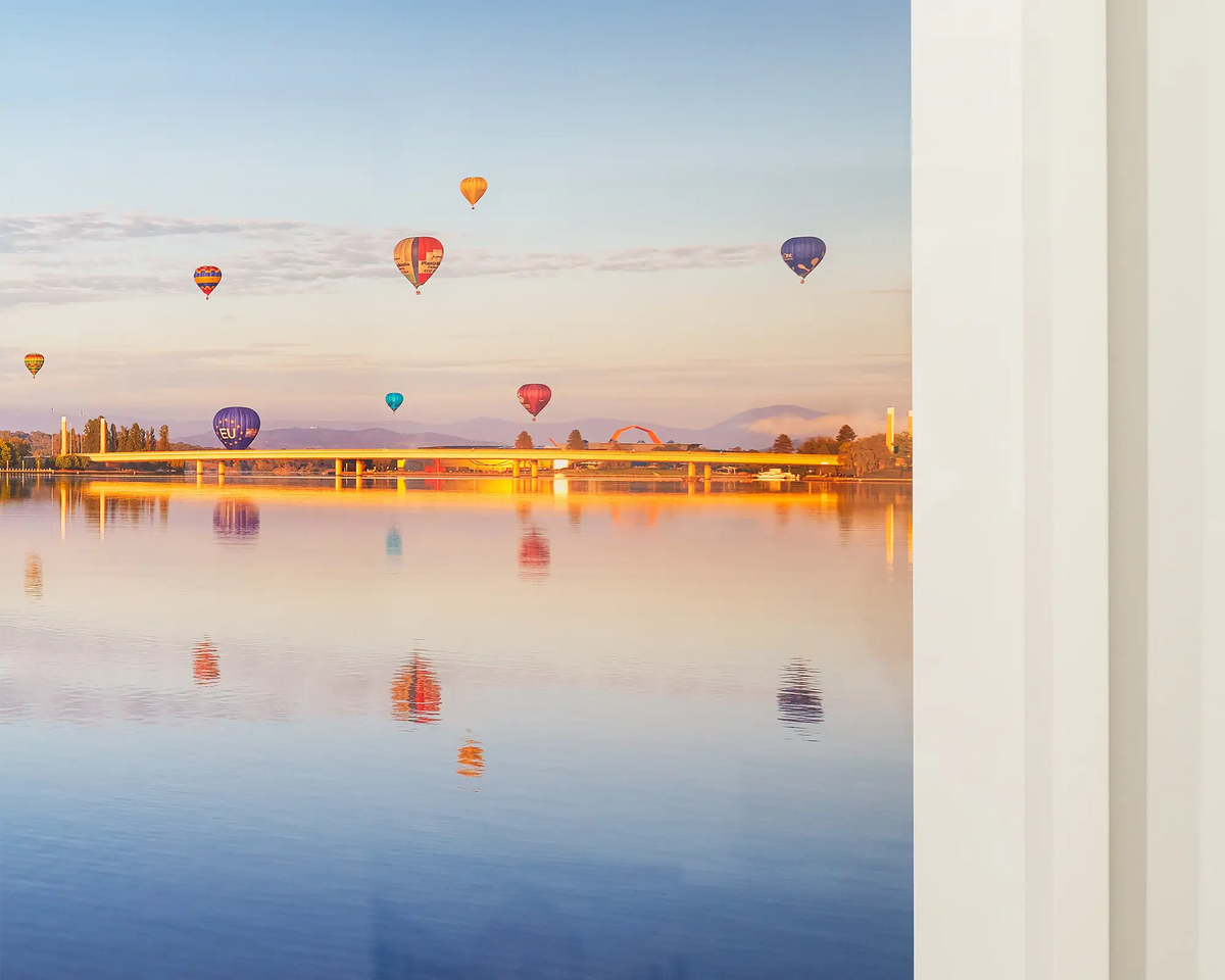 Dawn Drifters. Hot air balloons over Canberra at sunrise during the balloon spectacular. Canberra wall art in gallery detail.