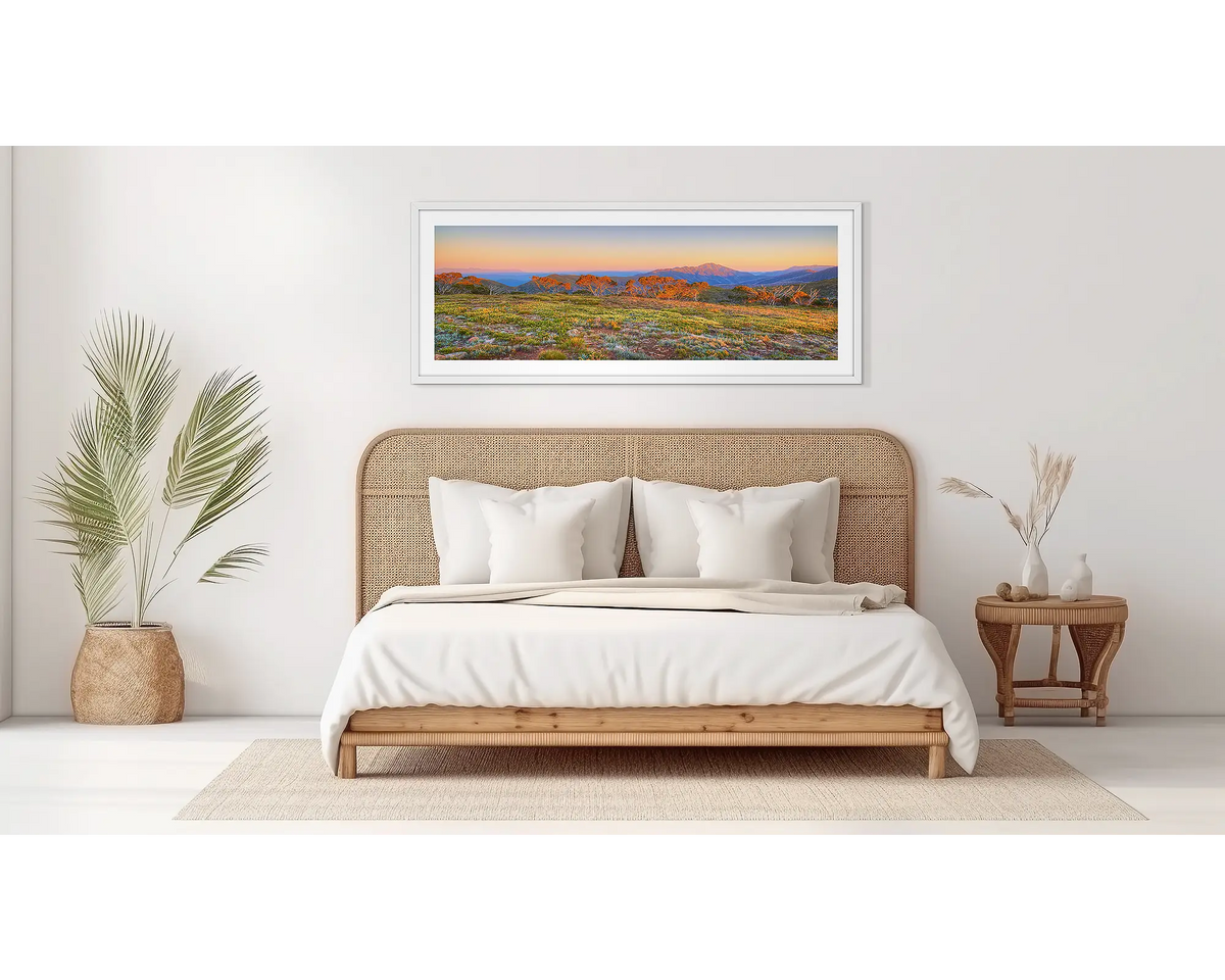 Day Break. Victorian alps wall art, in a white frame, on a bedroom wall. 