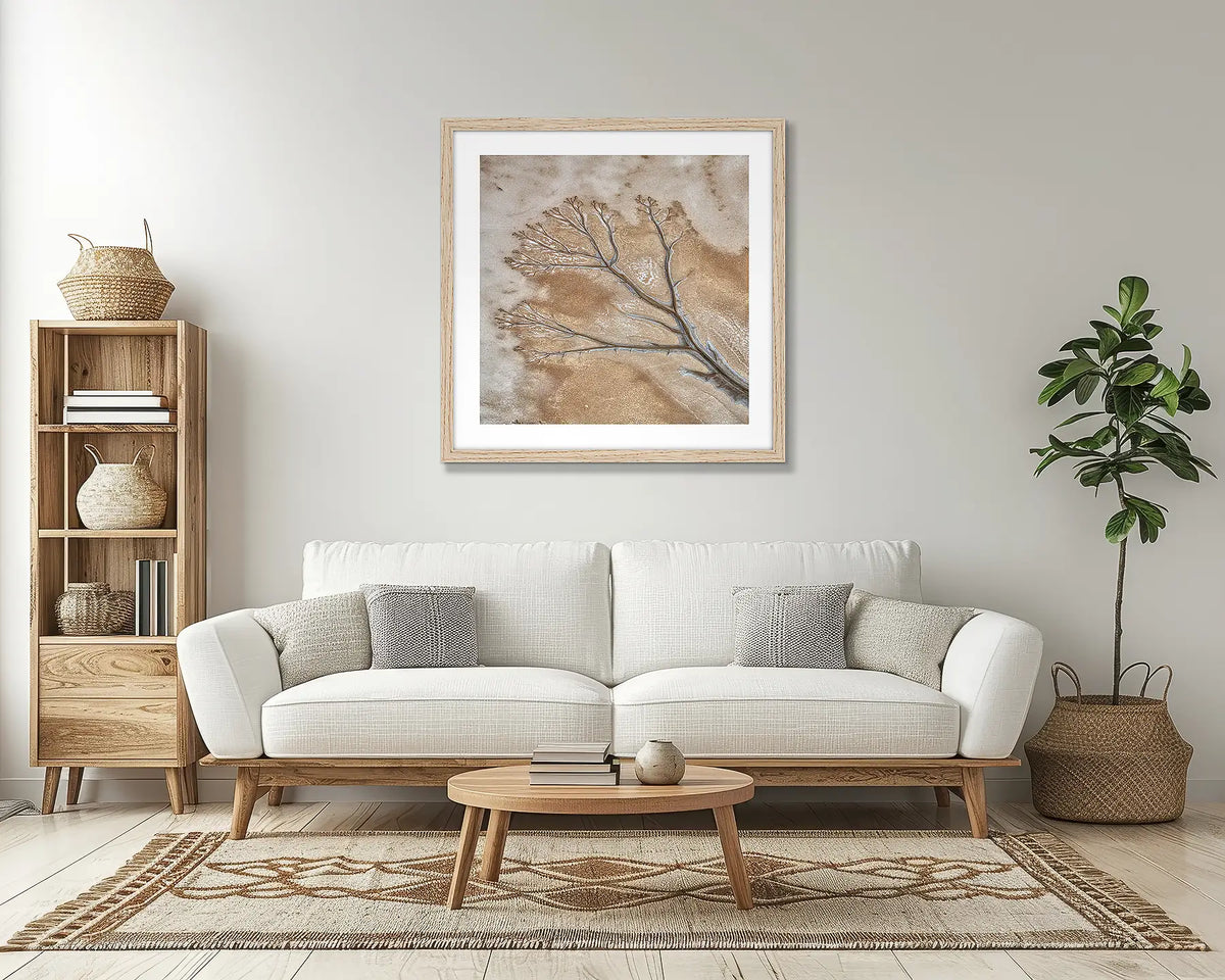 Dispersion. Abstract Kimberley wall art print with a timber frame, in a lounge room.