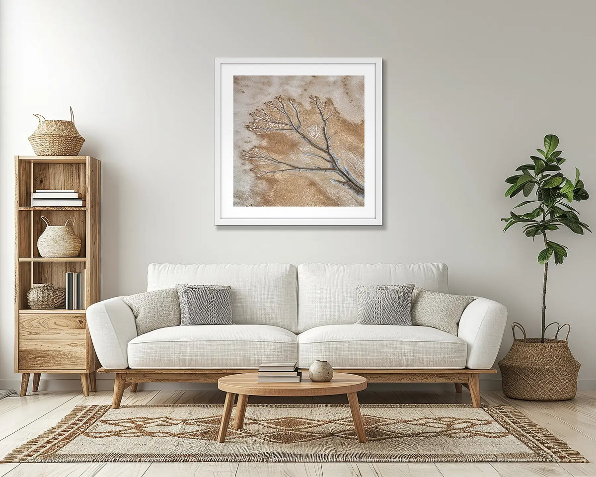 Dispersion. Abstract Kimberley wall art print with a white frame, in a lounge room.