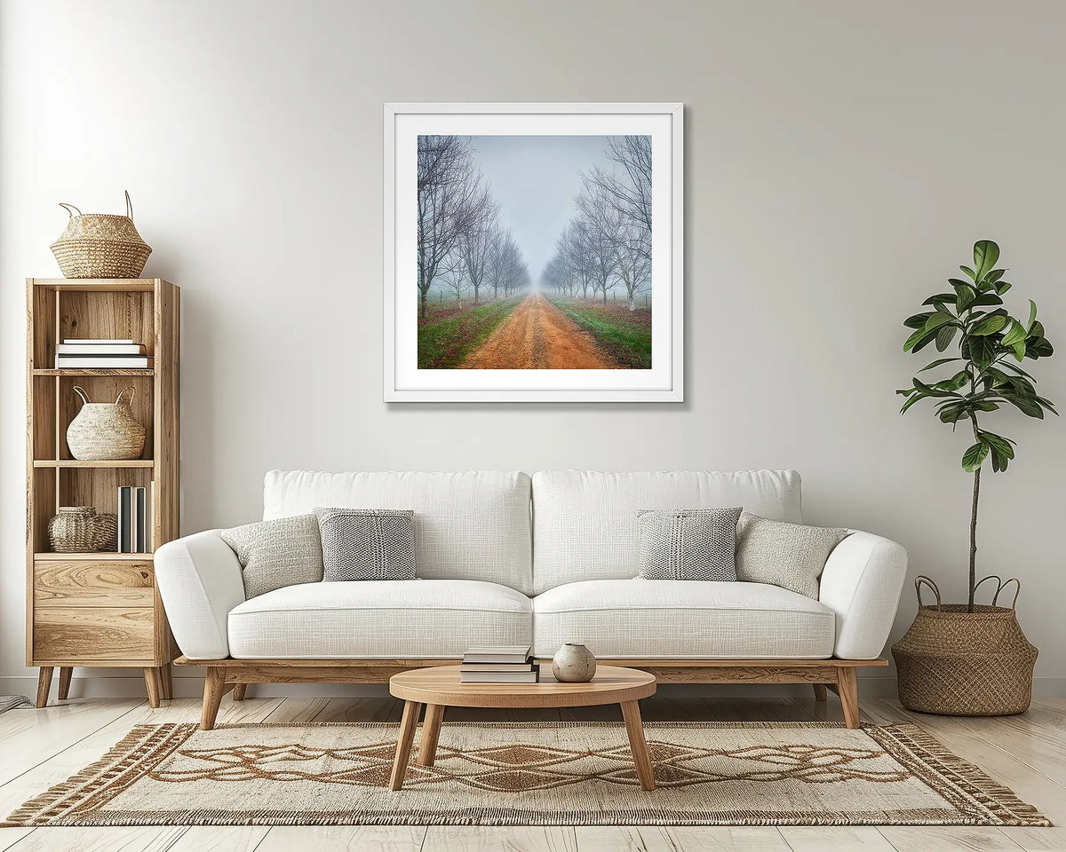 Down the Road. Country wall art print, with a white frame, in a lounge room. 