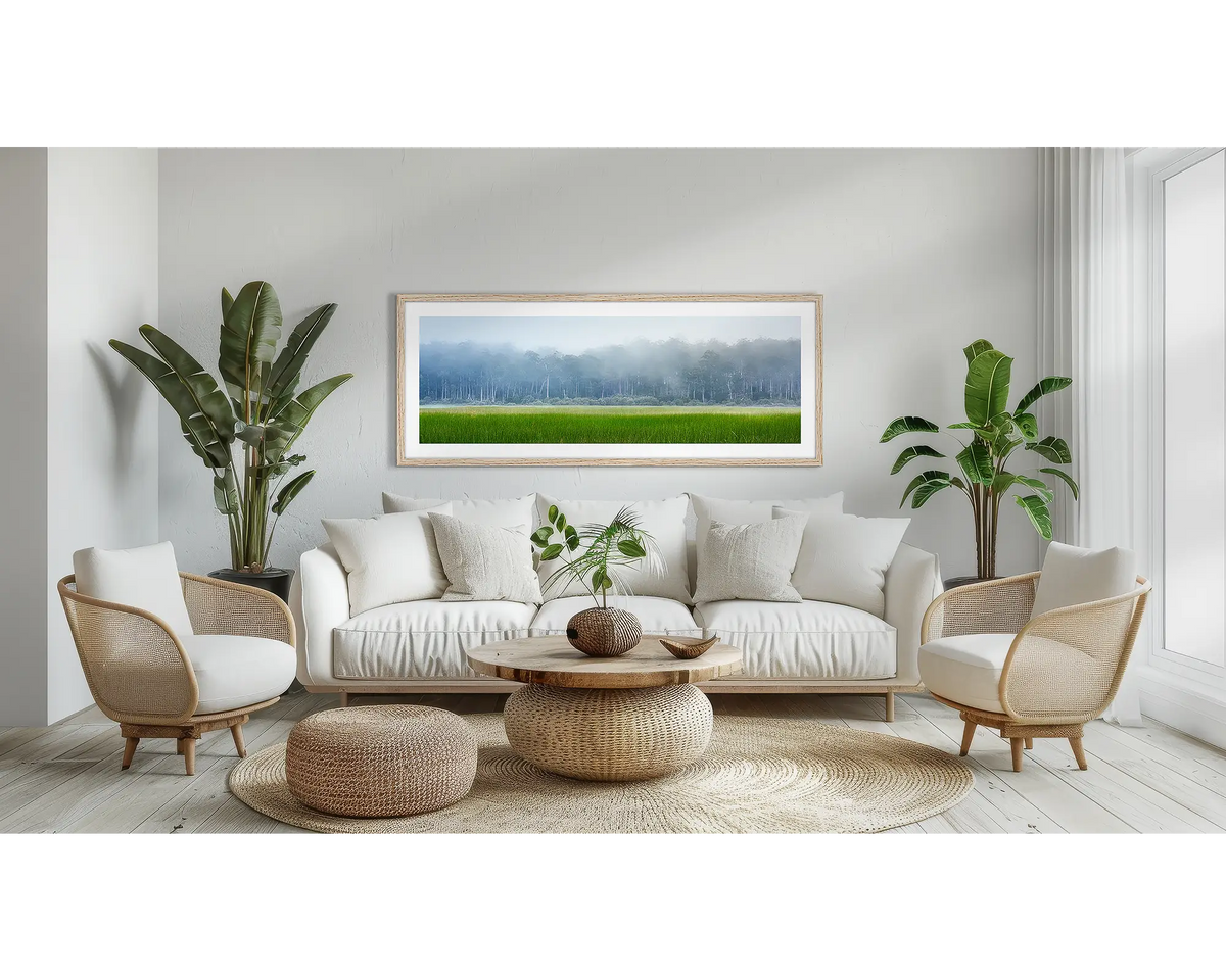 Edge of wilderness. Tasmanian wall art print in a timber frame, above a couch. 