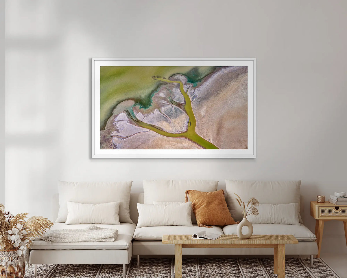 Embrace. Abstract Kimberley wall art print, with a white frame, on a lounge room wall. 