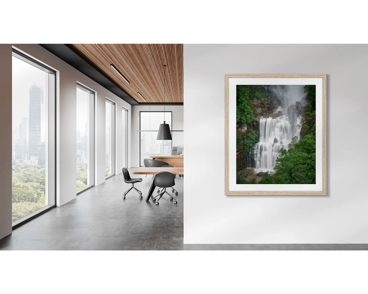 Energy. Waterfall wall art, in a wood frame, on an office wall. 