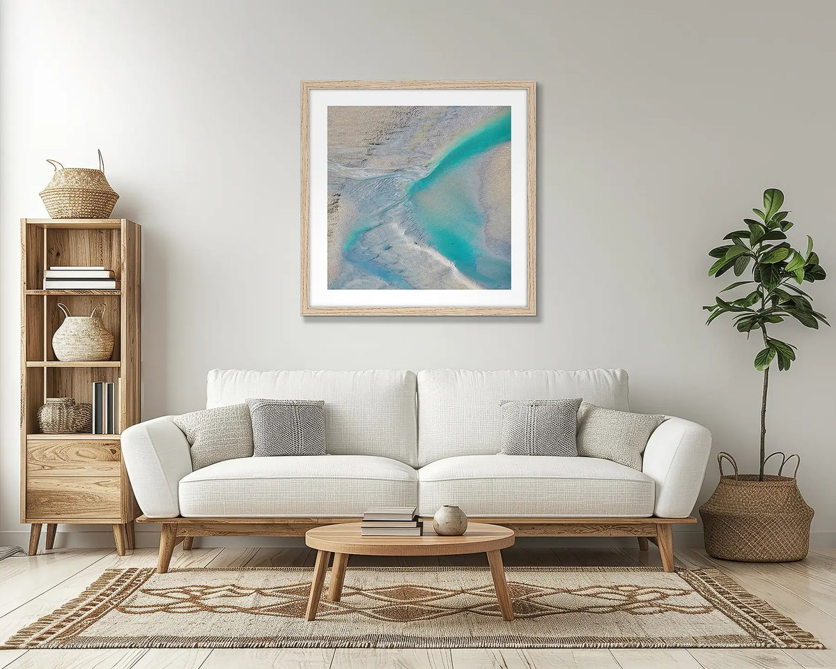 Escape. Abstract Kimberley wall art print with a timber frame, in a lounge room. 