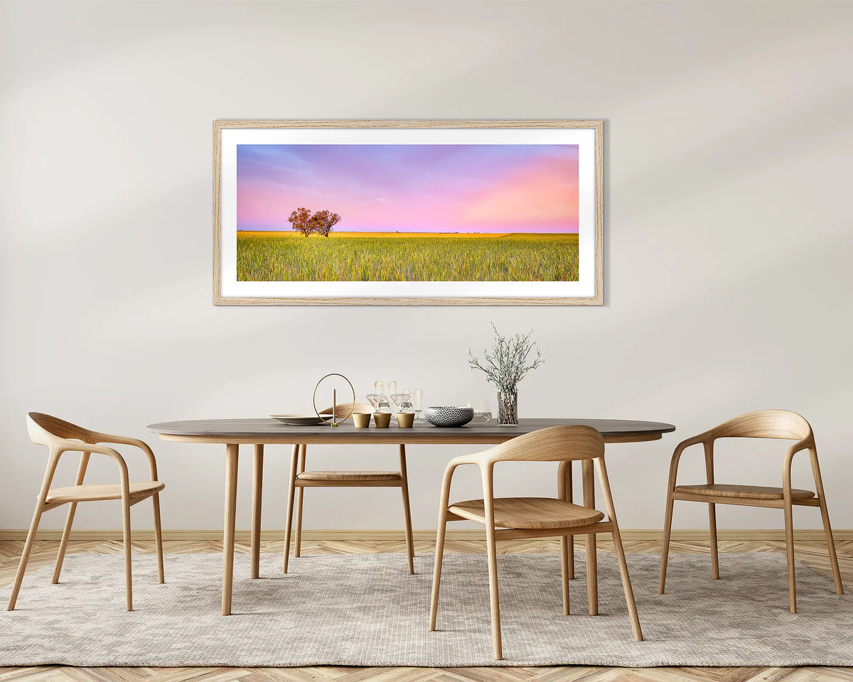 Farm Life. Country sunset, framed wall art with a Tassie oak frame, on a dining room wall. 