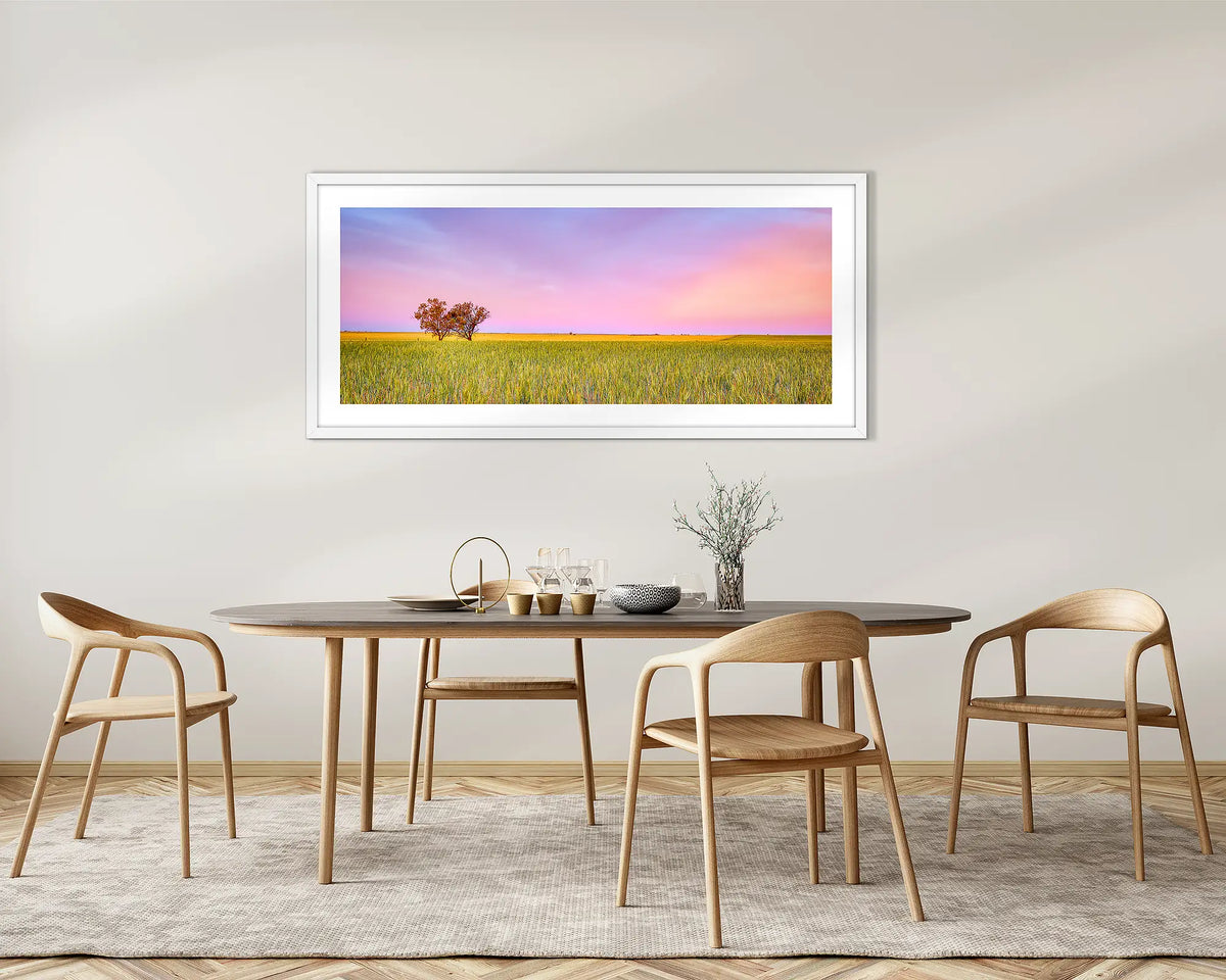 Farm Life. Country sunset, framed wall art with a white frame, on a dining room wall. 