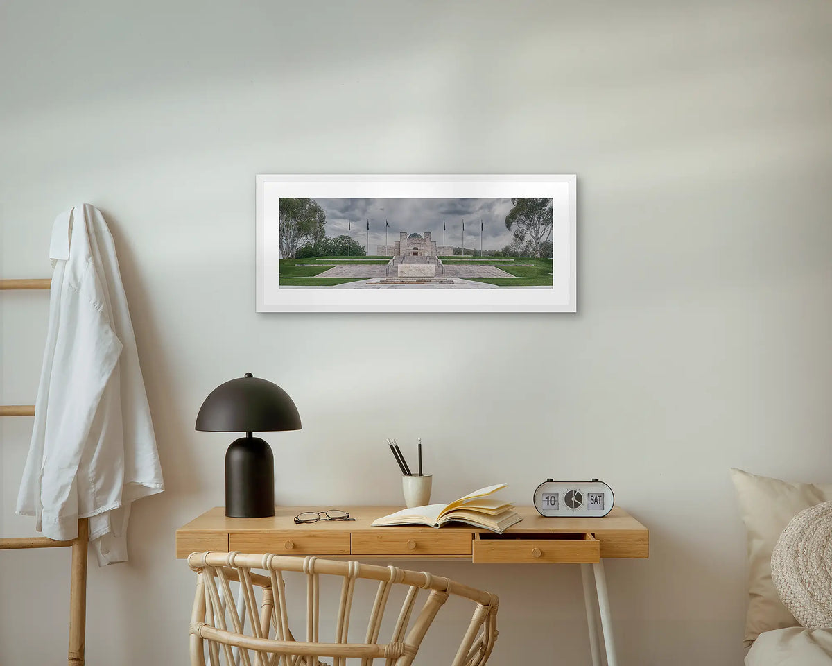 For the Fallen. Australian War Memorial, wall art print with a white frame, above a bedside table.