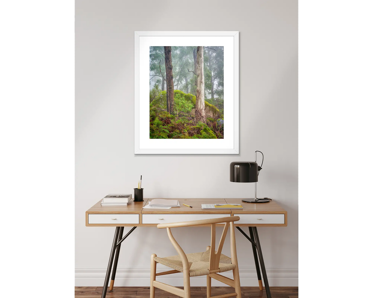 Forest Friends - Mount Buffalo wall art print with white frame, hanging above desk.