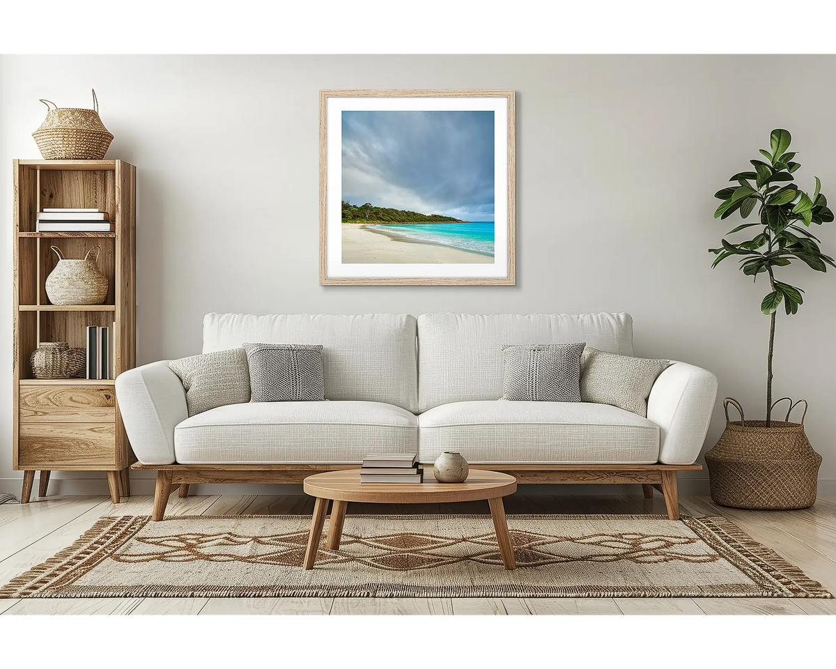 Geographe Calm. Coastal wall art with a timber frame, in a lounge room. 