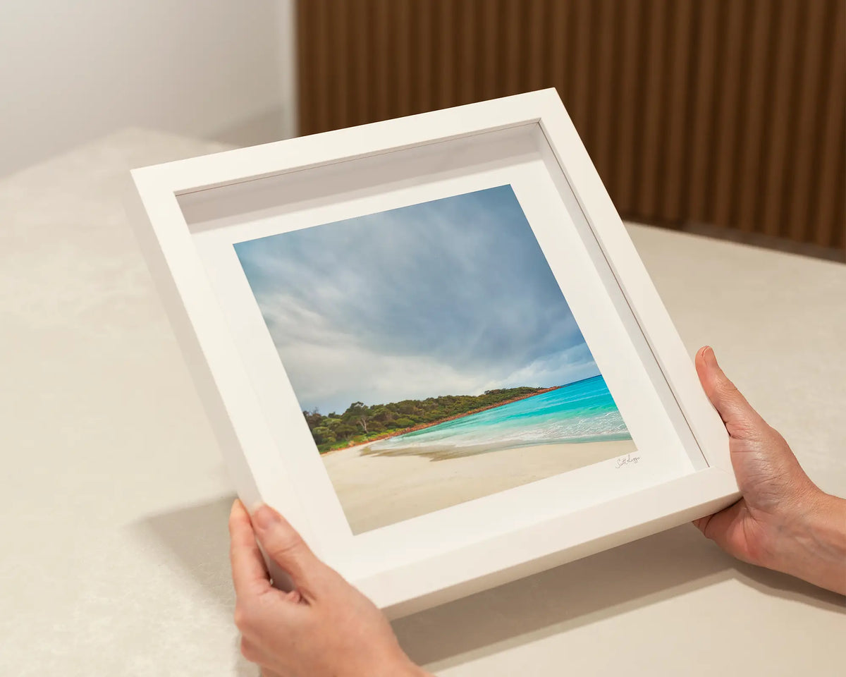 Geographe Calm. Meelup beach small, square framed print in a white frame.