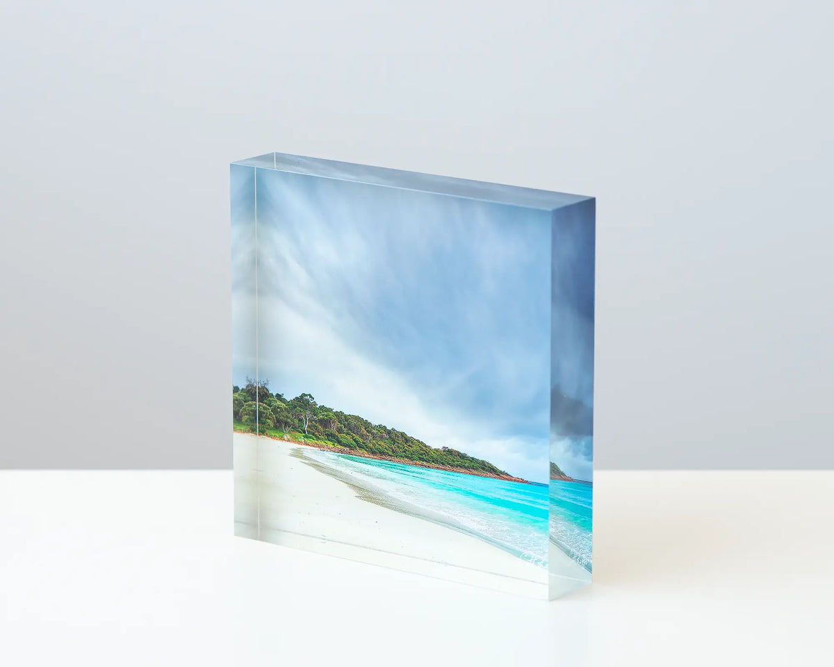 Geographe Calm acrylic block displayed on a desk. 