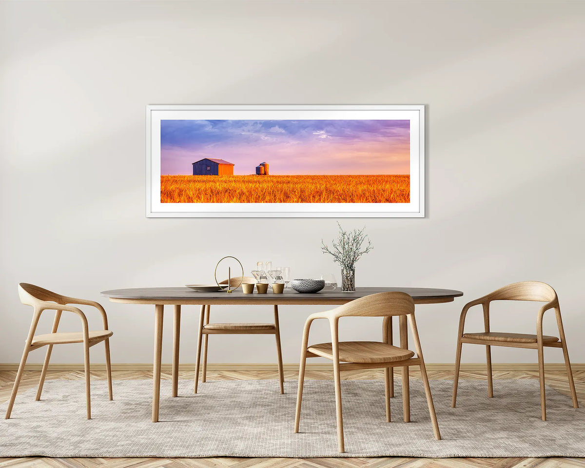 Golden Wheat. Country wheat field sunset, framed wall art with a white frame, on a dining room wall. 