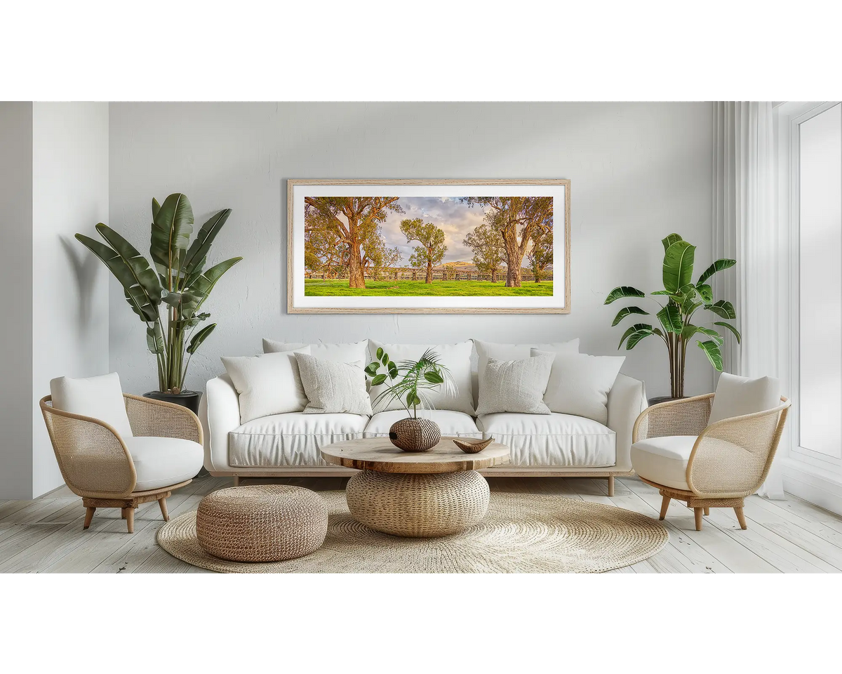 Gundagai Heritage. Country wall art print, with a Tassie oak frame, above a couch. 