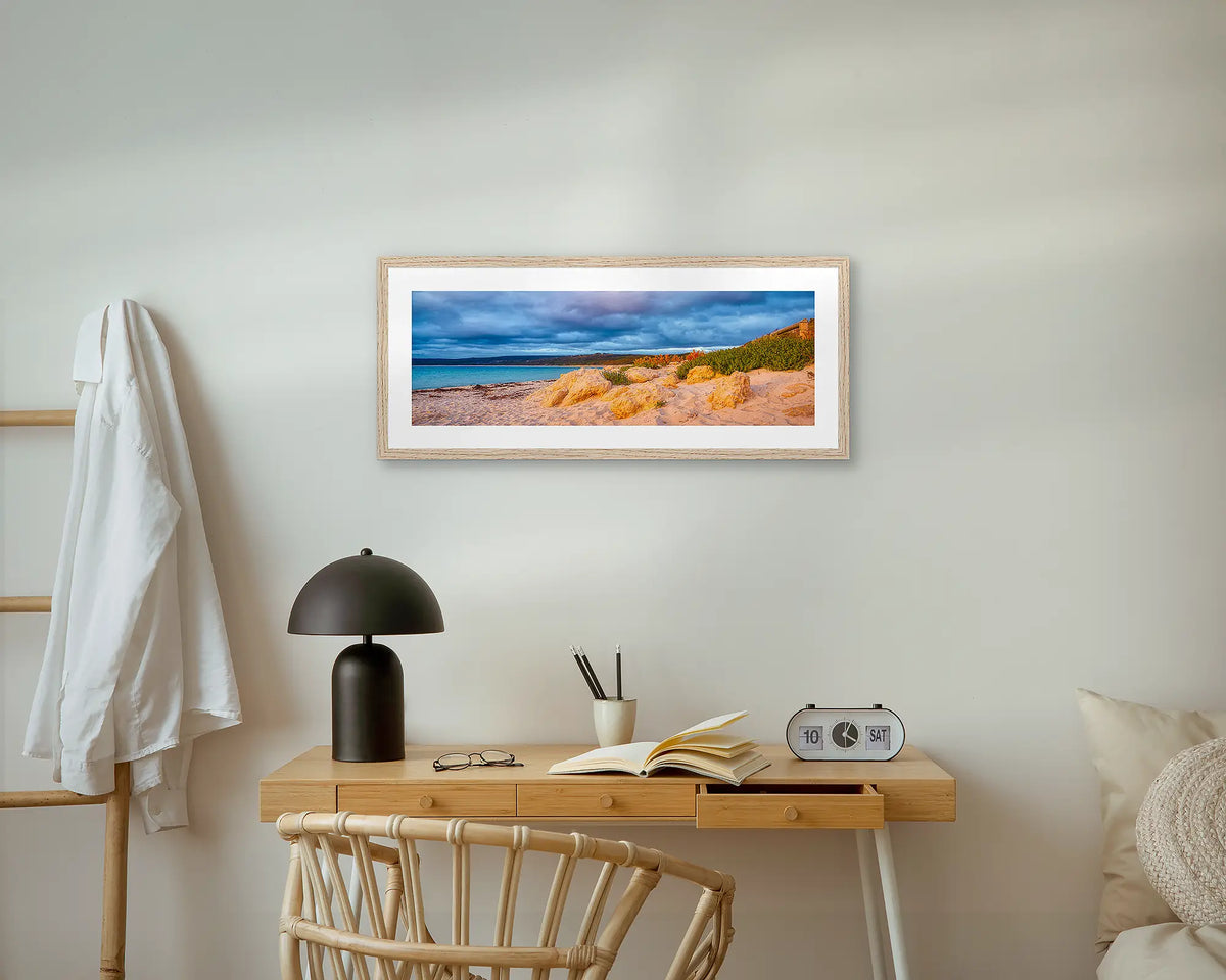 Hamelin Sunset. Hamelin Bay, coastal wall art print, with an oak frame, above a bedside table. 