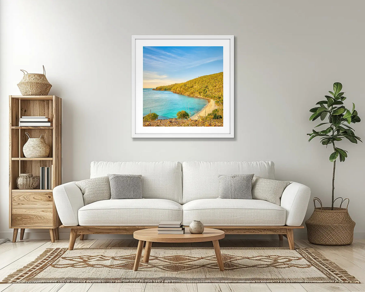 Hayman Harmony. Tropical Island wall art print, with a white frame, in a lounge room. 