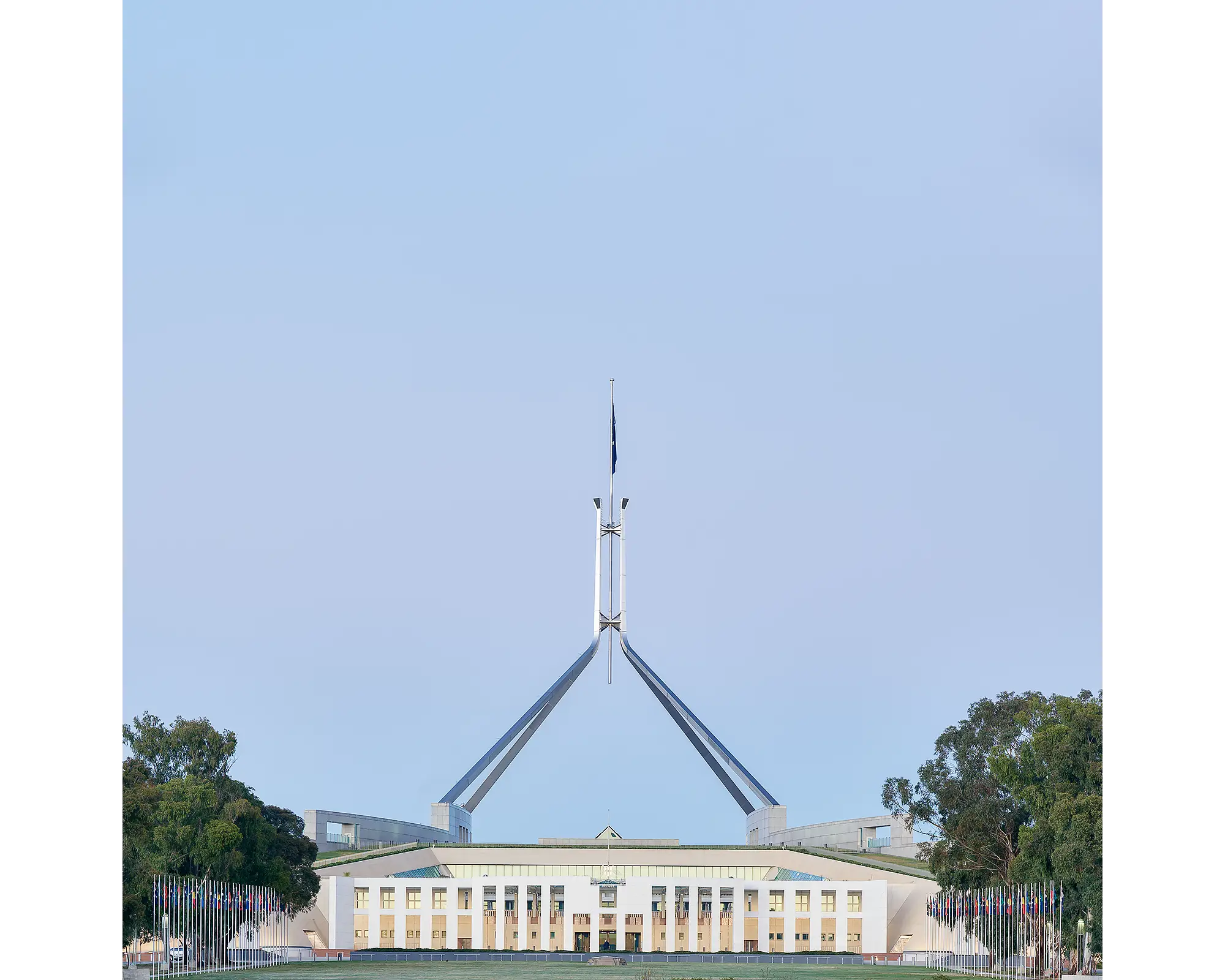 Australian Parliament House at sunrise with clear skies, Canberra.