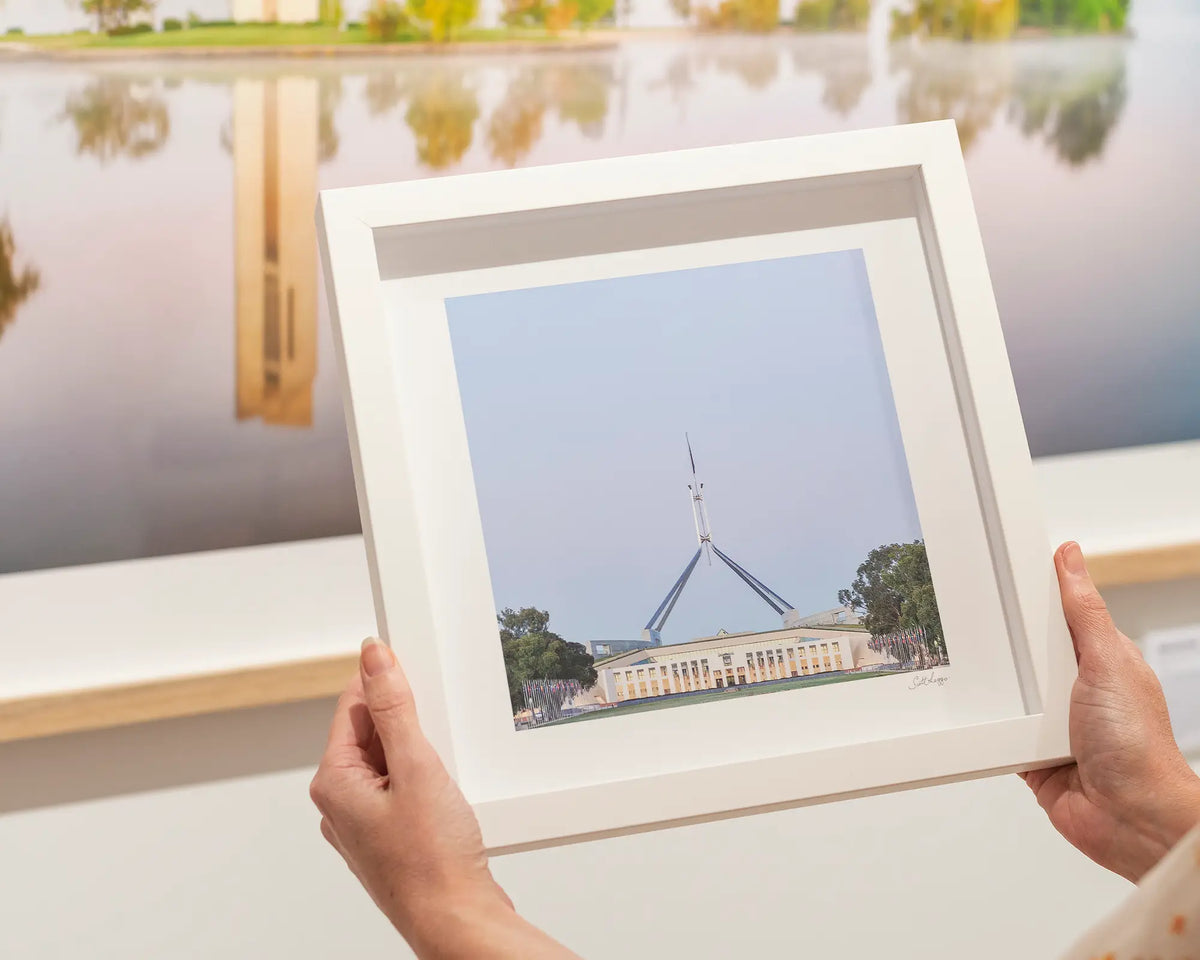 House on the Hill. Autumn Dawn small framed print in a white frame.