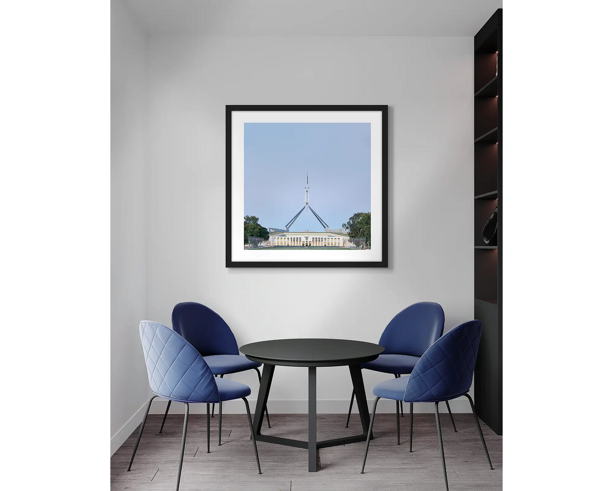 House on the Hill. Parliament House, wall art print, with a black frame, in an office meeting room. 