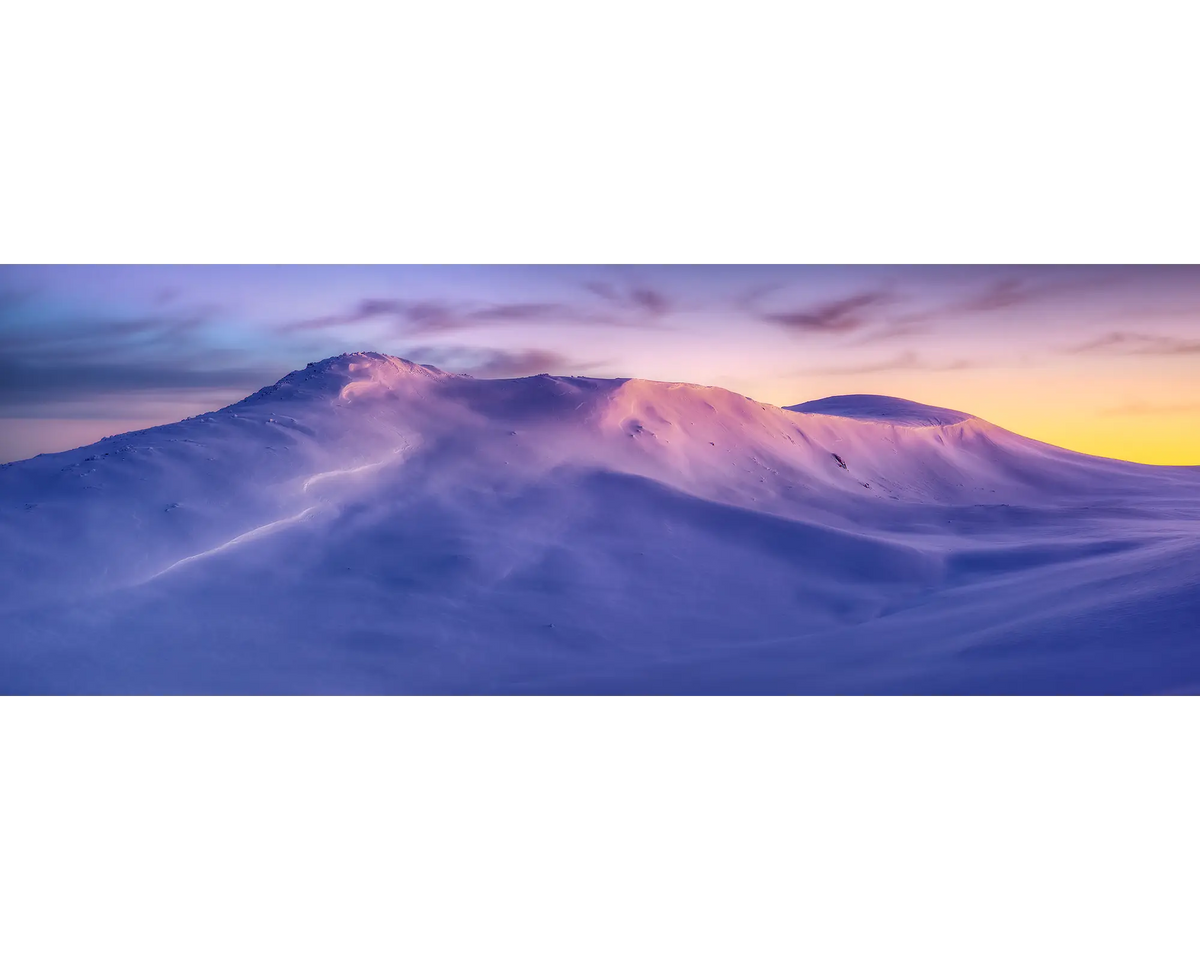 Sunrise over Mount Kosciuszko in winter, Kosciuszko National Park, NSW. 