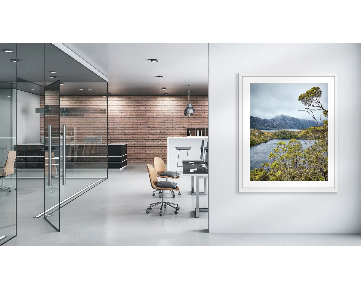 Lake View. Tasmanian wall art print, with a white frame, on a modern office wall. 