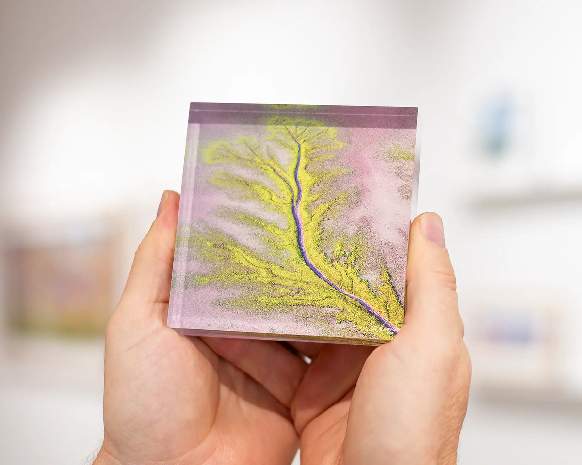 Lumination - Kimberley acrylic block being held in hands.