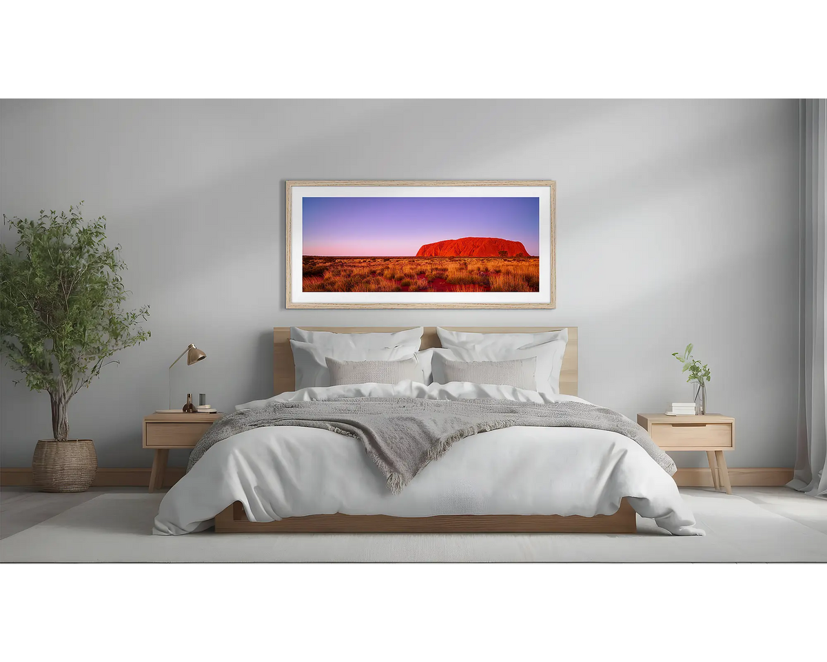 Majestic Uluru. Framed wall art above a bed. 